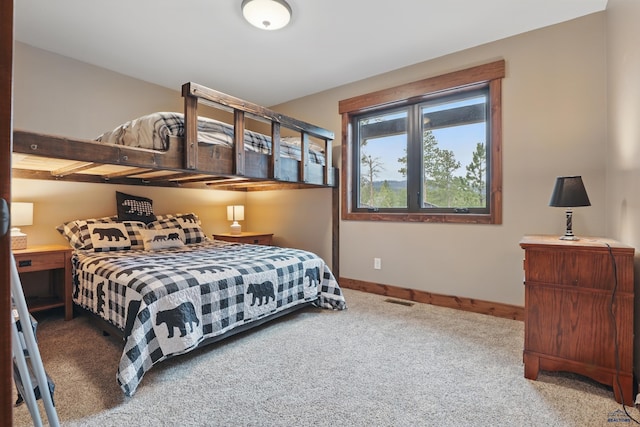 21298 Ridgewood Trl, Lead, SD 57754 - carpeted bedroom featuring visible vents and baseboards