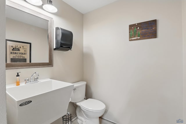 21298 Ridgewood Trl, Lead, SD 57754 - bathroom with a sink and toilet