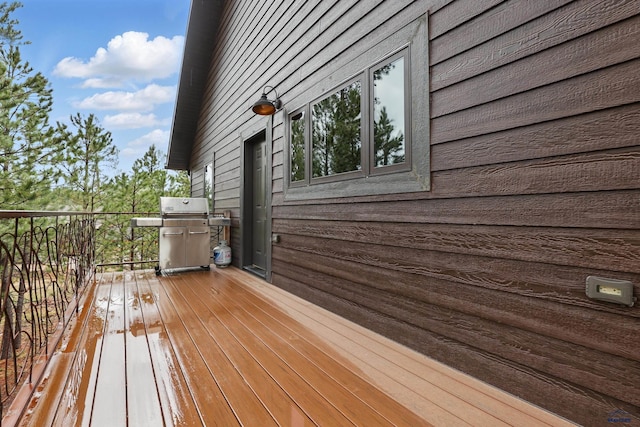 21298 Ridgewood Trl, Lead, SD 57754 - wooden terrace with a grill