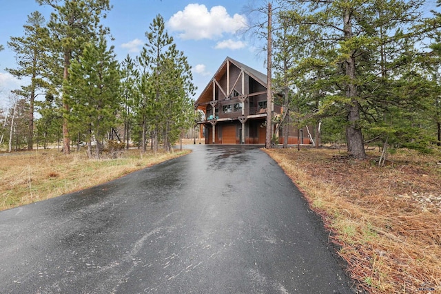 21298 Ridgewood Trl, Lead, SD 57754 - rustic home featuring aphalt driveway
