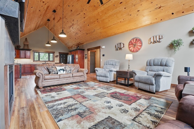 21298 Ridgewood Trl, Lead, SD 57754 - living room featuring lofted ceiling, light wood-style flooring, and wood ceiling