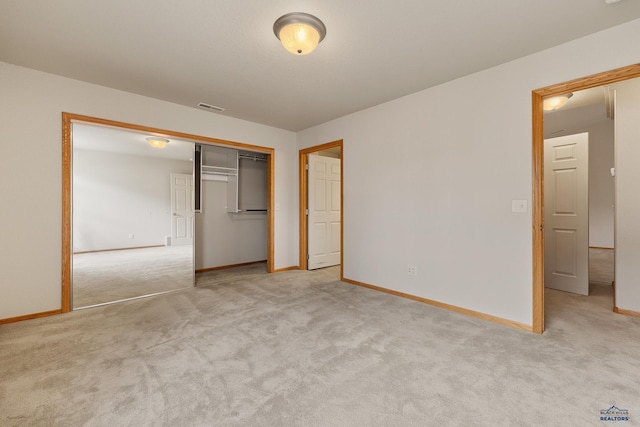 1960 Haycamp Ln, Rapid City, SD 57703 - unfurnished bedroom featuring carpet floors, baseboards, and visible vents