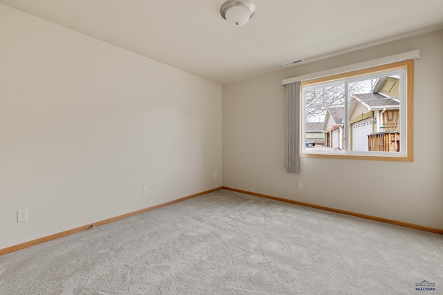1960 Haycamp Ln, Rapid City, SD 57703 - spare room featuring visible vents, baseboards, and carpet floors