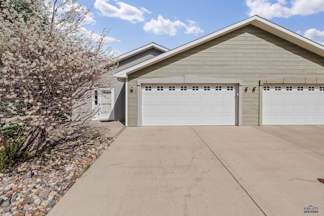 1960 Haycamp Ln, Rapid City, SD 57703 - view of front of property with driveway and a garage