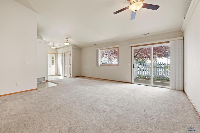 1960 Haycamp Ln, Rapid City, SD 57703 - carpeted empty room featuring a healthy amount of sunlight, baseboards, and visible vents