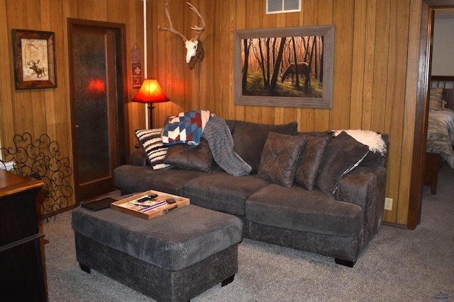2911 Orchard Ln, Rapid City, SD 57701 - carpeted living area with wooden walls and visible vents