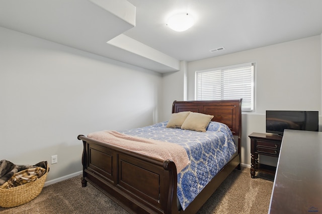 carpeted bedroom with baseboards