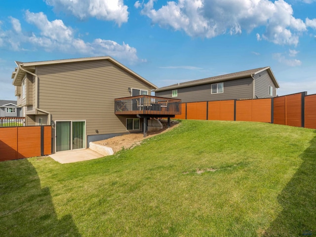 back of property featuring a deck
