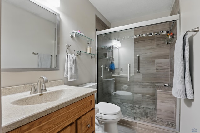 7315 Raven Ct, Rapid City, SD 57702 - full bathroom with toilet, a stall shower, and vanity