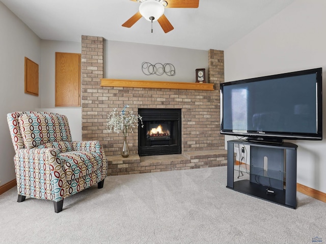 7315 Raven Ct, Rapid City, SD 57702 - living area with carpet, ceiling fan, and a fireplace