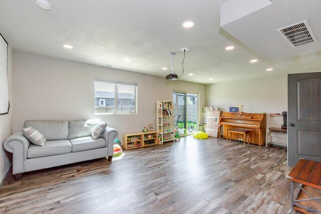 living area featuring recessed lighting and wood finished floors