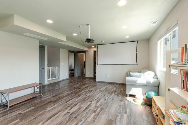 cinema with wood finished floors, recessed lighting, and baseboards
