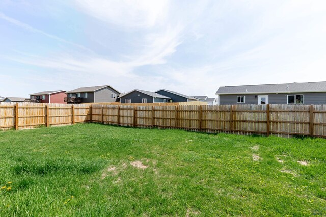view of yard featuring a residential view