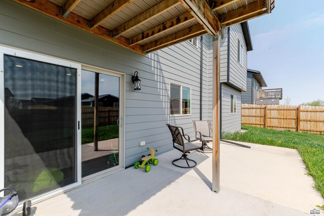 view of patio with fence