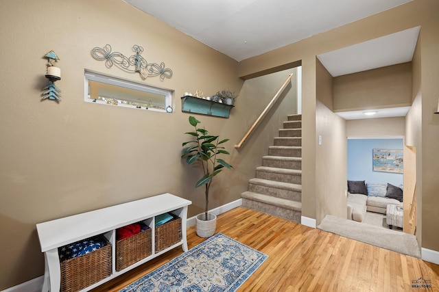 1580 Laurel Heights Dr, Rapid City, SD 57701 - stairway with wood finished floors and baseboards