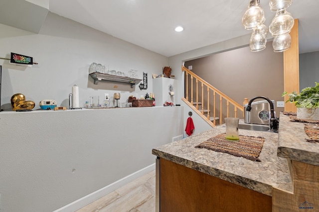 1580 Laurel Heights Dr, Rapid City, SD 57701 - indoor wet bar with stairs, recessed lighting, and decorative light fixtures
