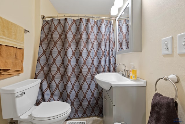 1580 Laurel Heights Dr, Rapid City, SD 57701 - bathroom with vanity, toilet, and a shower with curtain