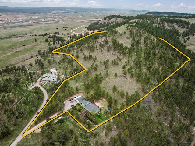 1580 Laurel Heights Dr, Rapid City, SD 57701 - aerial view of sparsely populated area featuring property boundaries highlighted and a mountainous background