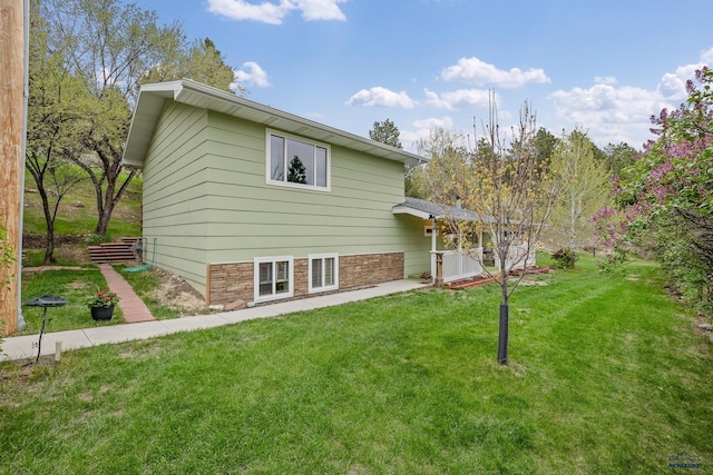 1580 Laurel Heights Dr, Rapid City, SD 57701 - rear view of property with a lawn
