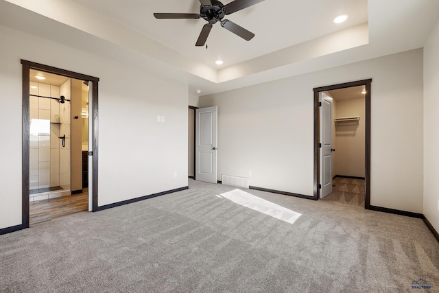 24035 Bridle Ridge Rd, Rapid City, SD 57701 - unfurnished bedroom with carpet, recessed lighting, baseboards, ensuite bath, and a spacious closet