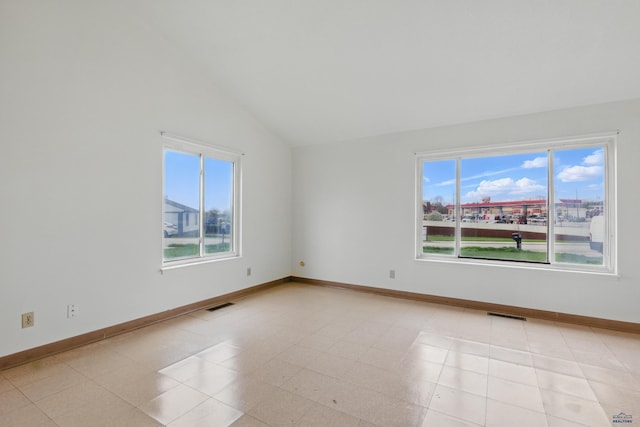 322 Curtis, Rapid City, SD 57702 - unfurnished room with lofted ceiling, plenty of natural light, and baseboards