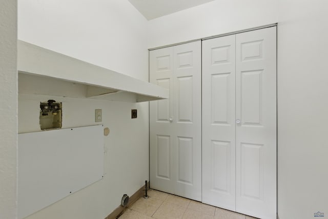 322 Curtis, Rapid City, SD 57702 - laundry room featuring light tile patterned floors