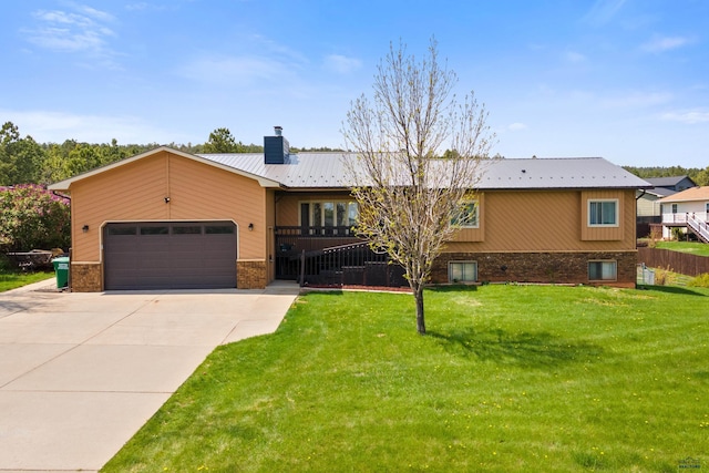 view of front of house featuring brick siding, a garage, a chimney, concrete driveway, and metal roof