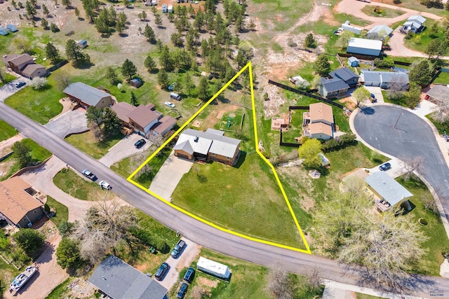 aerial perspective of suburban area featuring property boundaries highlighted