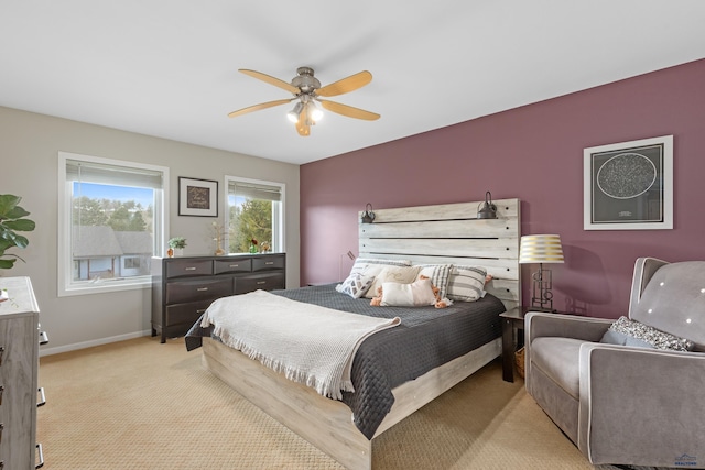 4037 Valley W Dr, Rapid City, SD 57702 - bedroom featuring baseboards, light carpet, and a ceiling fan