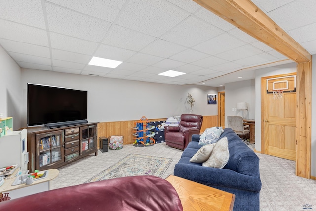 4037 Valley W Dr, Rapid City, SD 57702 - carpeted living area with wainscoting, wood walls, and a paneled ceiling