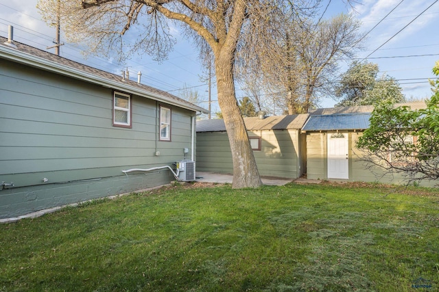 3432 Jackson Blvd, Rapid City, SD 57702 - back of property with a lawn and an outbuilding