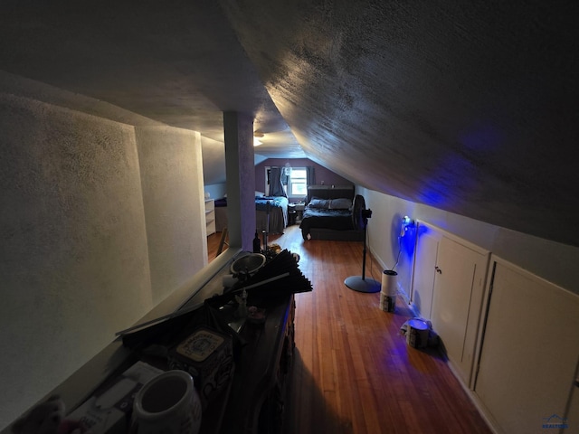 142 W Summit, Lead, SD 57754 - additional living space with wood finished floors and vaulted ceiling