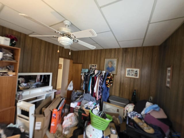 142 W Summit, Lead, SD 57754 - living room with ceiling fan and wooden walls