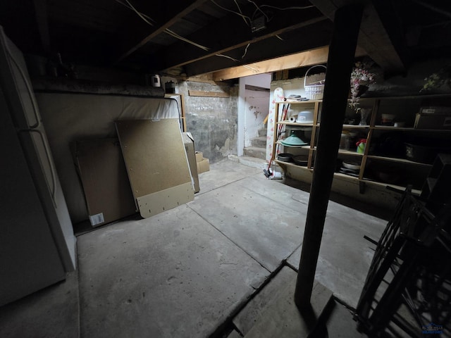 142 W Summit, Lead, SD 57754 - unfinished basement featuring freestanding refrigerator