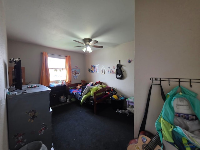 carpeted bedroom featuring ceiling fan