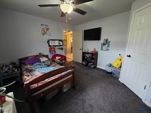 bedroom featuring carpet, ceiling fan, and baseboards