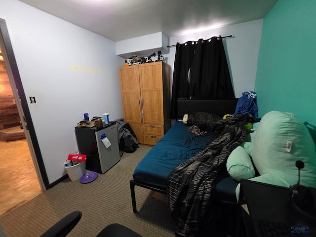 bedroom with light colored carpet