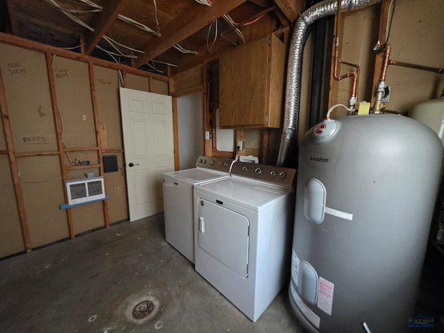 laundry room featuring washing machine and clothes dryer and water heater