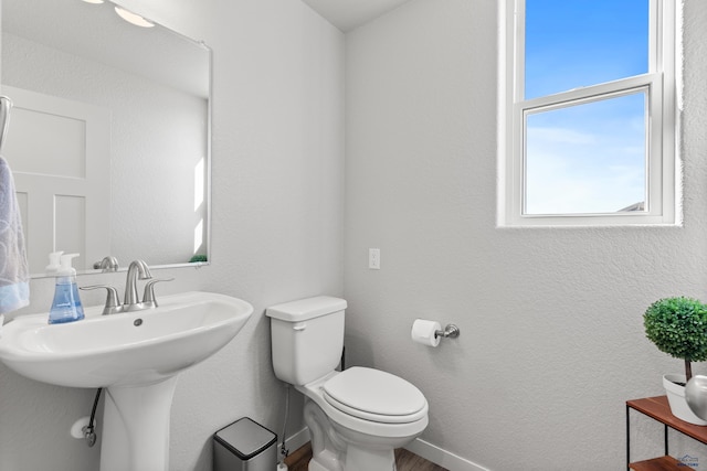 506 Solomon Ct, Rapid City, SD 57703 - bathroom with toilet and a sink