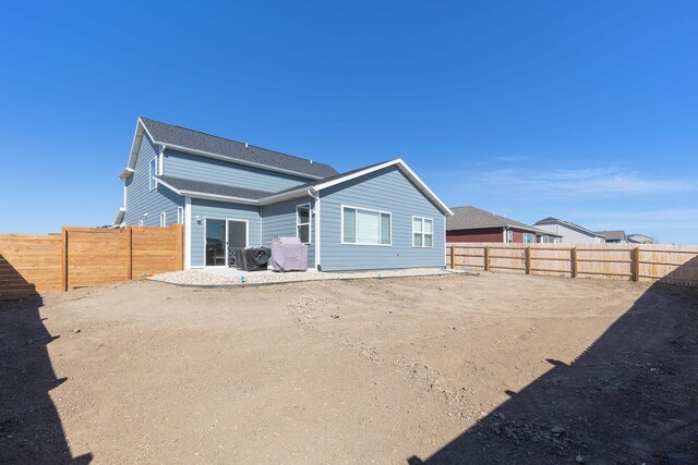 506 Solomon Ct, Rapid City, SD 57703 - rear view of property featuring a fenced backyard