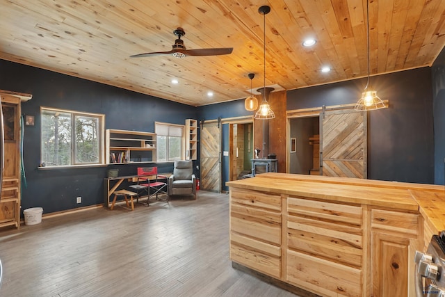 24427 Thovson Rd, Keystone, SD 57751 - kitchen featuring a barn door, wooden ceiling, healthy amount of natural light, butcher block countertops, and recessed lighting