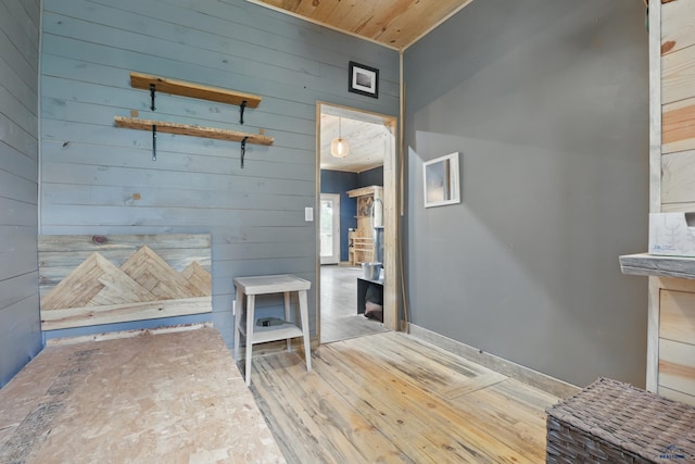 24427 Thovson Rd, Keystone, SD 57751 - interior space with wood walls and wood finished floors