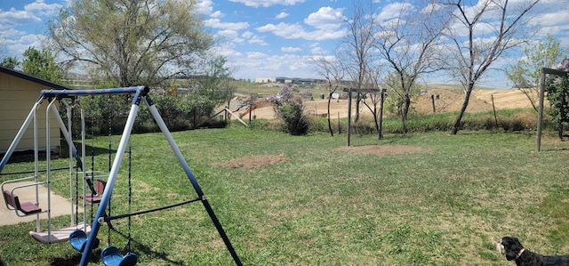 4218 Sweetbriar, Rapid City, SD 57703 - view of grassy yard with a playground