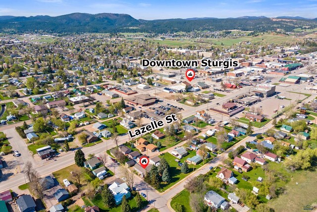 819 Sly St, Sturgis, SD 57785 - aerial view of property and surrounding area featuring a mountain backdrop