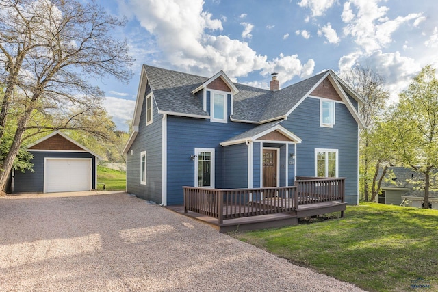 1316 Clark, Rapid City, SD 57701 - view of front facade with a shingled roof, an outbuilding, a detached garage, a chimney, and a deck