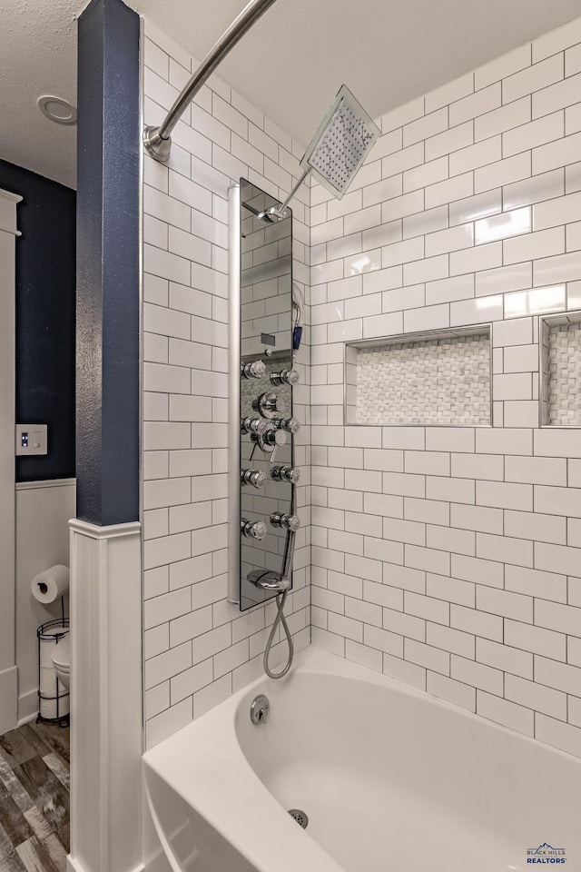 1316 Clark, Rapid City, SD 57701 - full bath with shower / tub combination, wood finished floors, and toilet