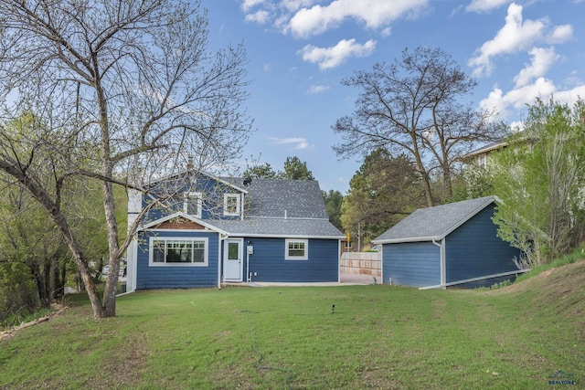 1316 Clark, Rapid City, SD 57701 - view of front of house with a front yard and an outdoor structure