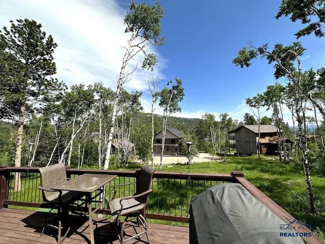 21172 Last Chance Trl, Lead, SD 57754 - wooden terrace with area for grilling and outdoor dining area
