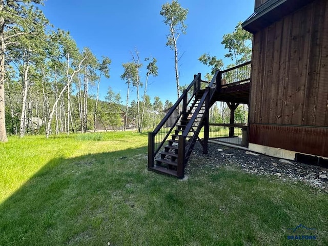 21172 Last Chance Trl, Lead, SD 57754 - view of green lawn featuring stairway and a deck
