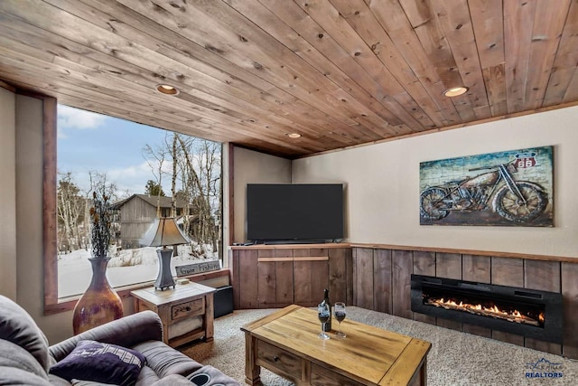 21172 Last Chance Trl, Lead, SD 57754 - carpeted living room with a fireplace, wood ceiling, and recessed lighting